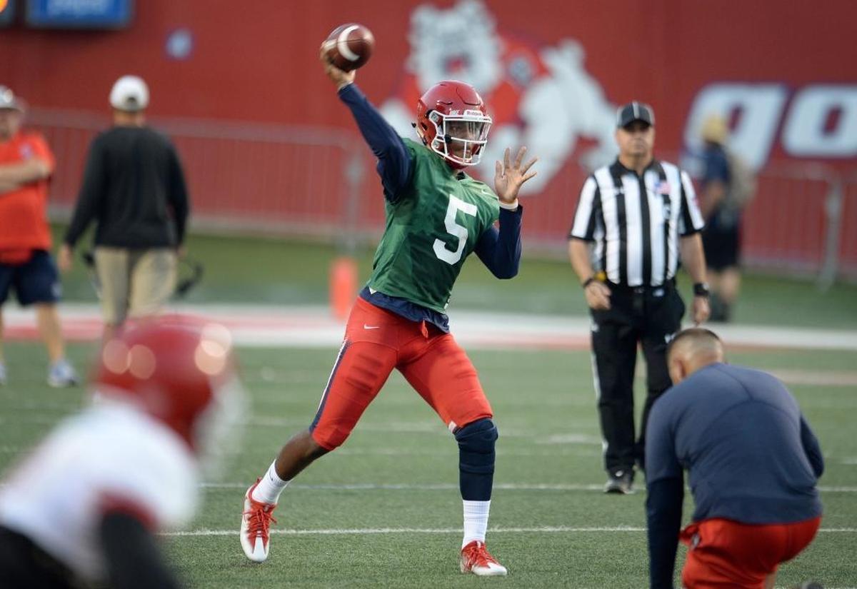 Fresno State quarterback Chason Virgil practices with the team as part of Fan Appreciation Day, which included the only fall scrimmage open to the public, on Saturday, Aug. 19, 2017, at Bulldog Stadium.
