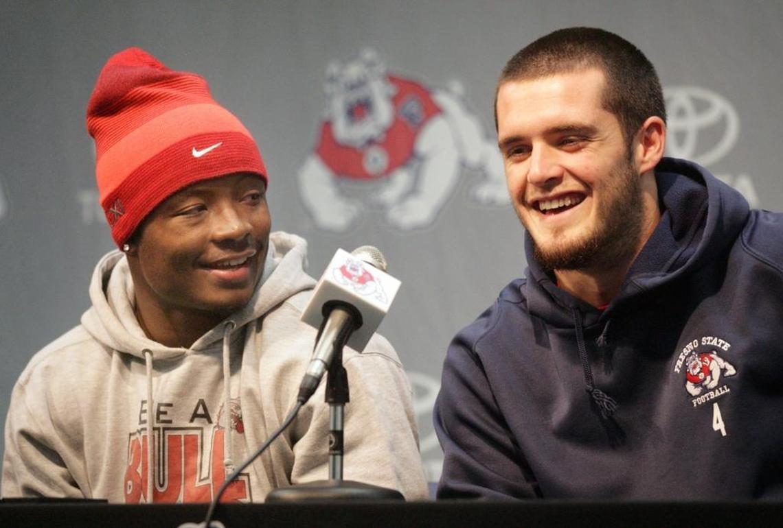 Fresno State running back Robbie Rouse, left, and quarterback Derek Carr were all smiles during a news conference ahead of the 2012 Hawaii Bowl.