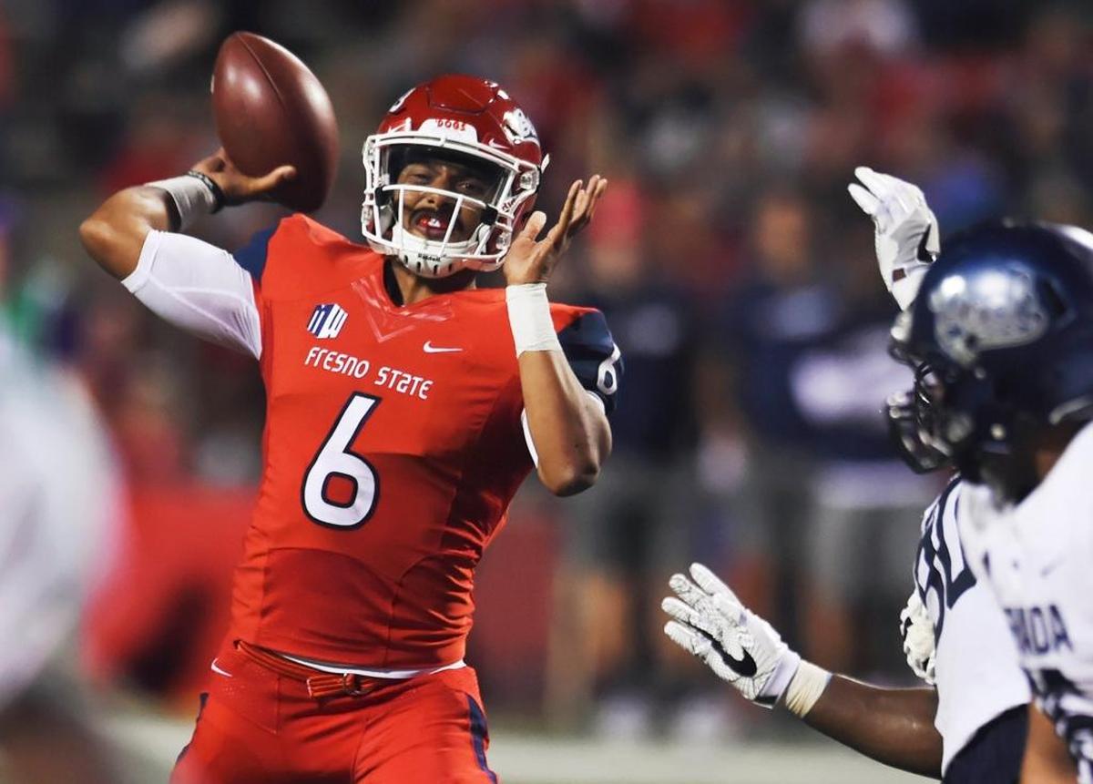 Fresno State quarterback Marcus McMaryion fires a pass in the Bulldogs’ 41-21 victory over Nevada on Saturday, Sept. 30, 2017, in Fresno. McMaryion completed his first 12 passes and finished 24 of 32 for 296 yards and two touchdowns. The former Dinuba High star is leading the Mountain West Conference in completion percentage and passing efficiency rating and is second in yards per attempt.