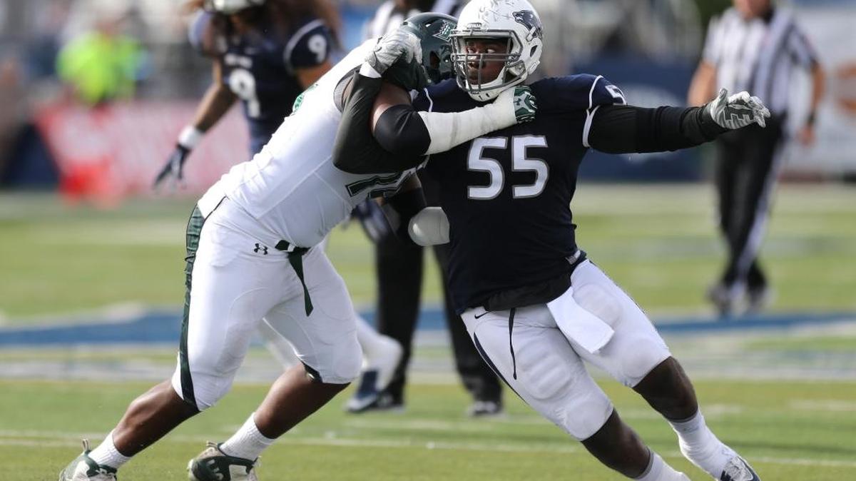 Hawaii’s RJ Hollis tries to hold off Nevada’s Rykeem Yates in an Oct. 24, 2015, game. Yates, who prepped at Fresno’s Edison High, returns home Thursday to play Fresno State at Bulldog Stadium.