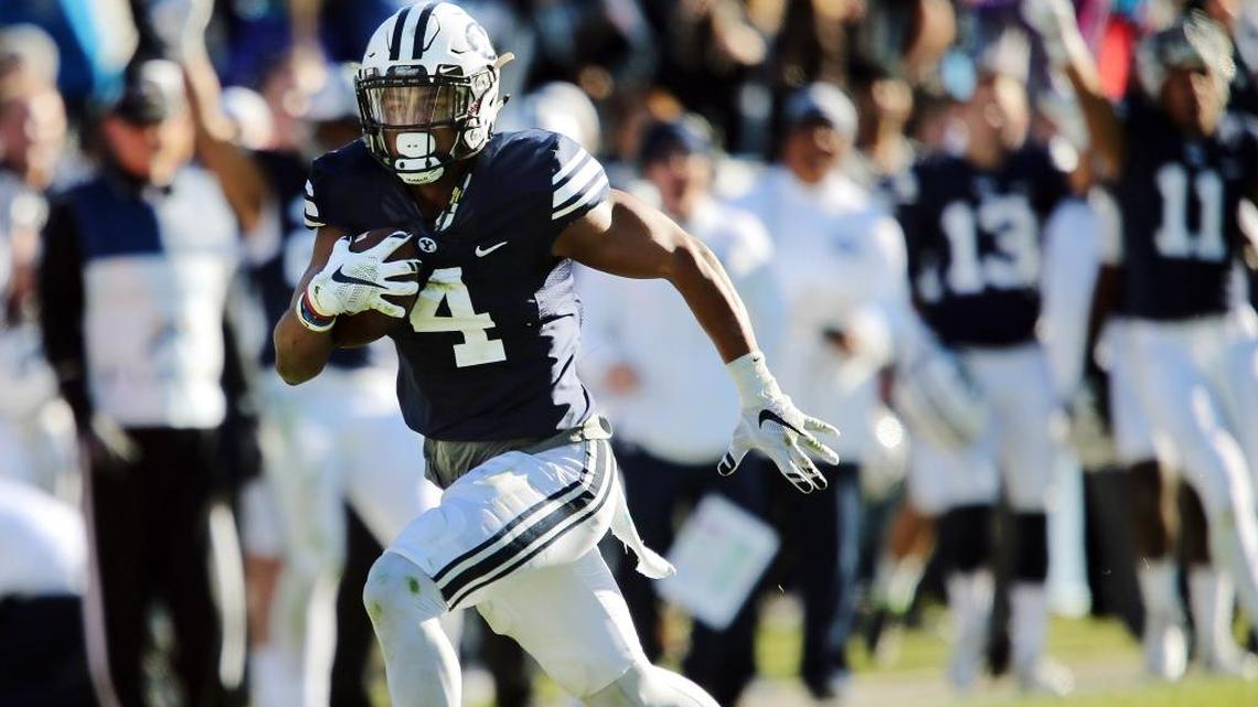 BYU linebacker Fred Warner runs back an interception against Fresno State in Provo, Utah, Saturday, Nov. 21, 2015.