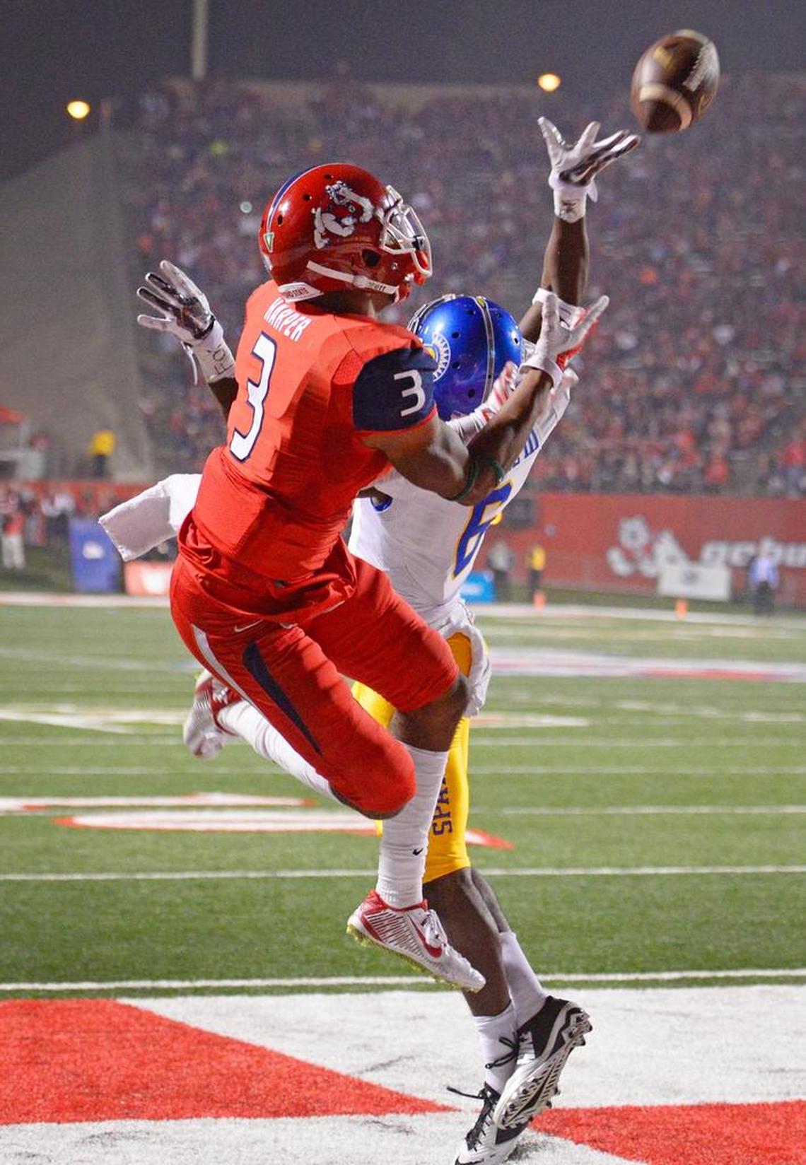 Fresno State’s Josh Harper catches a touchdown pass in a 2014 game.
