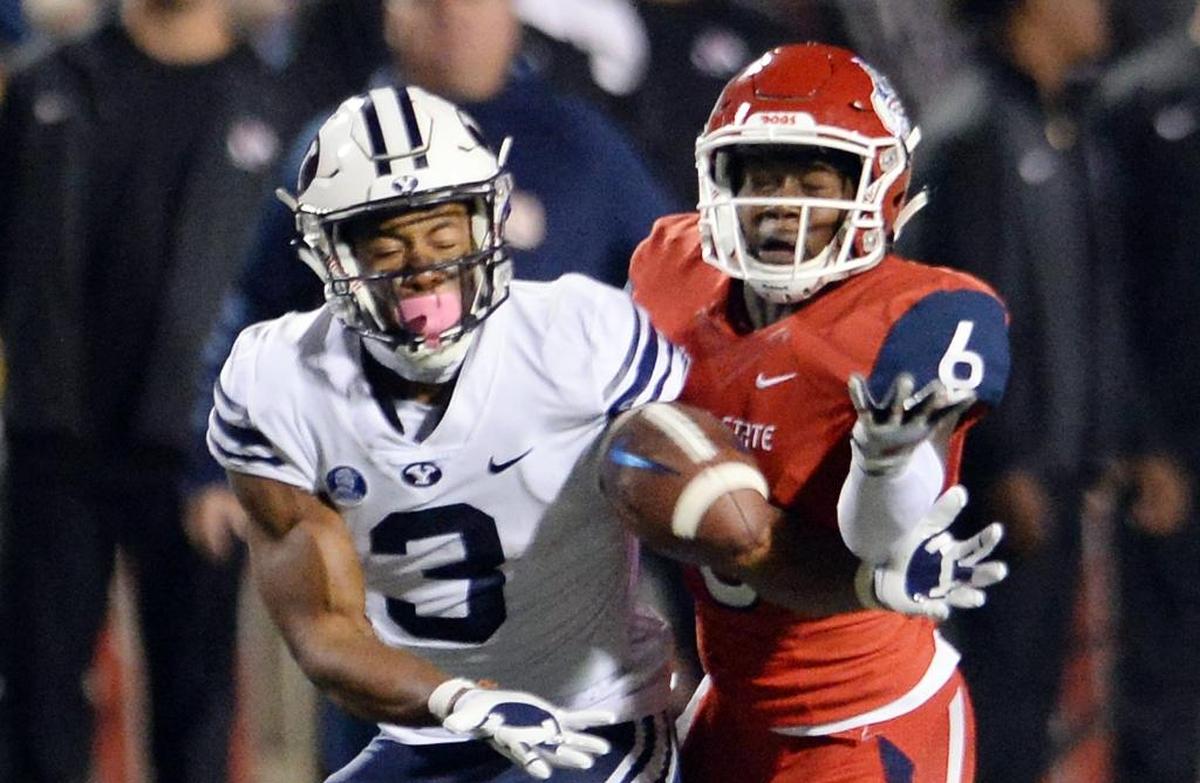 Fresno State cornerback Tank Kelly breaks up a pass intended for BYU’s Jonah Trinnaman in the Bulldogs’ victory over the Cougars last season. The Bulldogs’ secondary faces a Power Five-sized challenge at Minnesota on Saturday, Sept. 8, 2018.