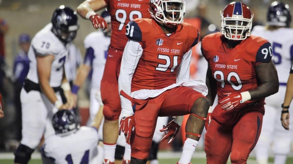 
Fresno State linebacker Ejiro Ederaine, center, has seen his vocal leadership rub off on his teammates as the unit tries to turn things around this season.
