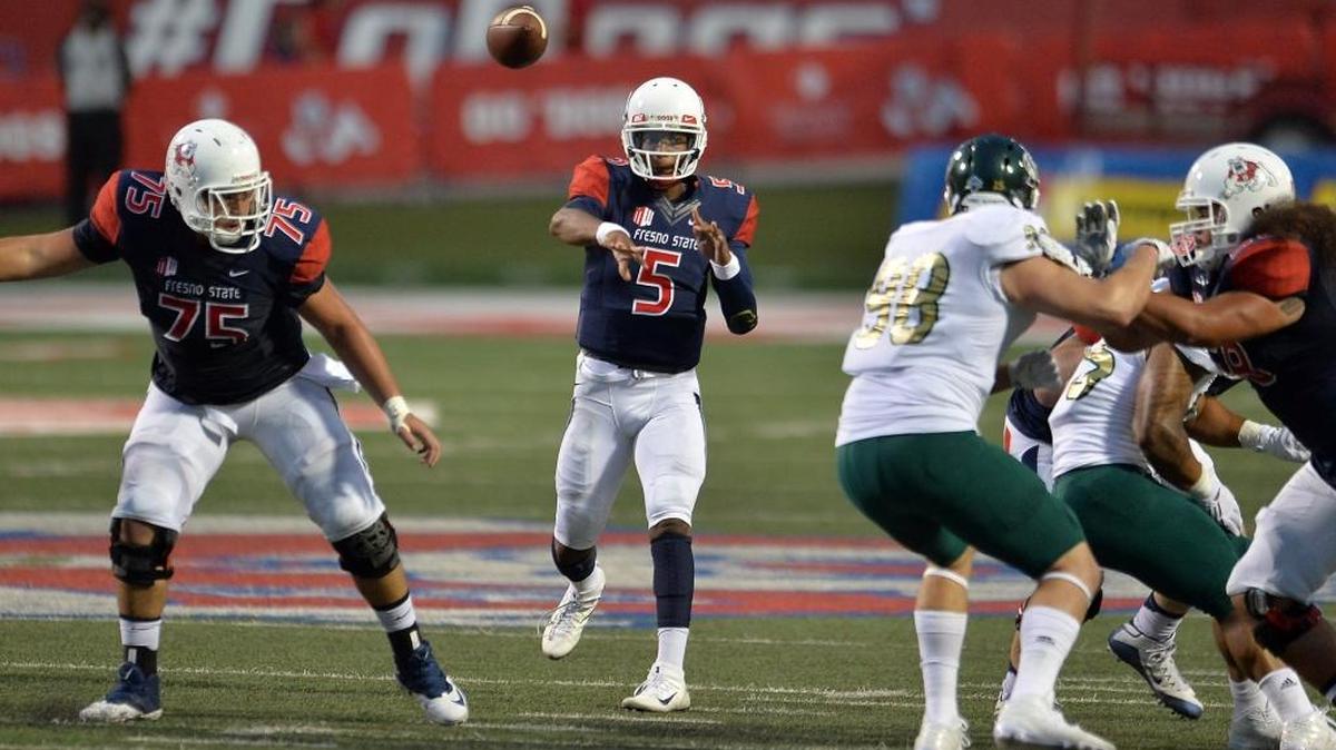 Fresno State doesn’t need quarterback Chason Virgil (No. 5) to be “Superman,” offensive coordinator Eric Kiesau said. “Just settle in and do your one-eleventh.”