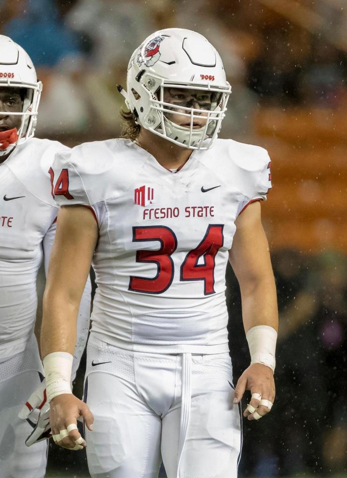 Fresno State linebacker George Helmuth (34) didn’t have plans to watch the first CFP rankings come out on television. Instead, it was going to be film of UNLV, the Bulldogs’ next opponent. “It’s exciting, but if you lose to UNLV it doesn’t really matter,” he said.