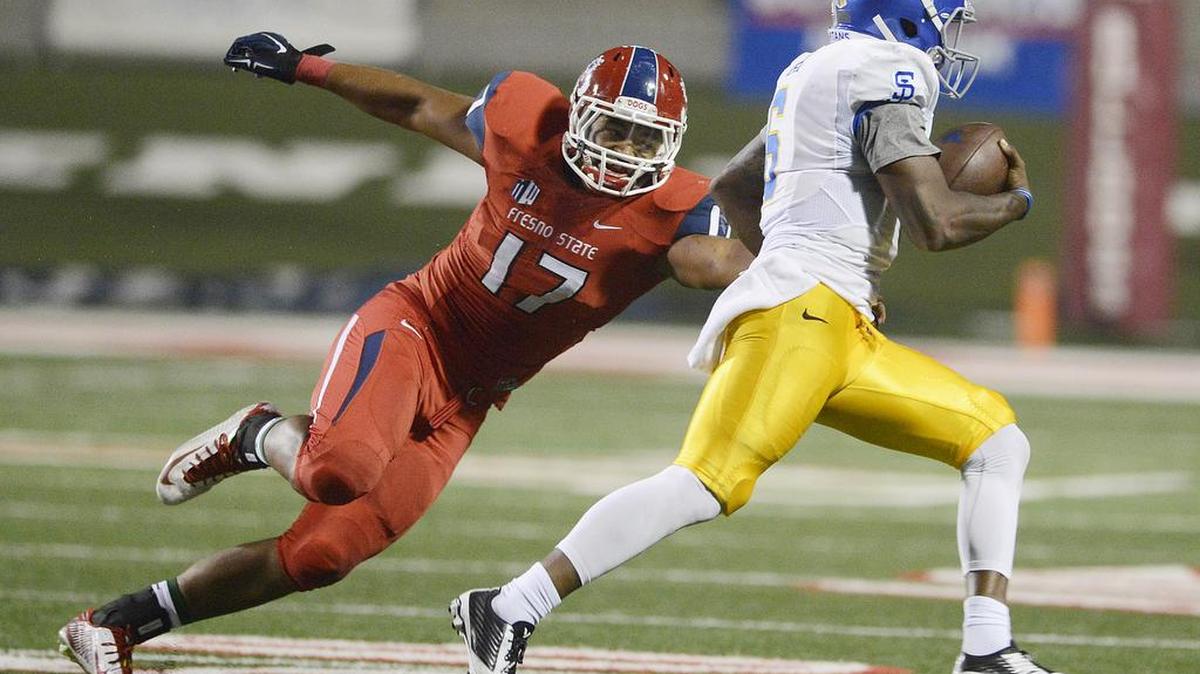 Linebacker Kyrie Wilson, left, is one of seven former Fresno State football players to sign free-agent deals following the 2016 NFL draft. Wilson has signed with the Oakland Raiders.