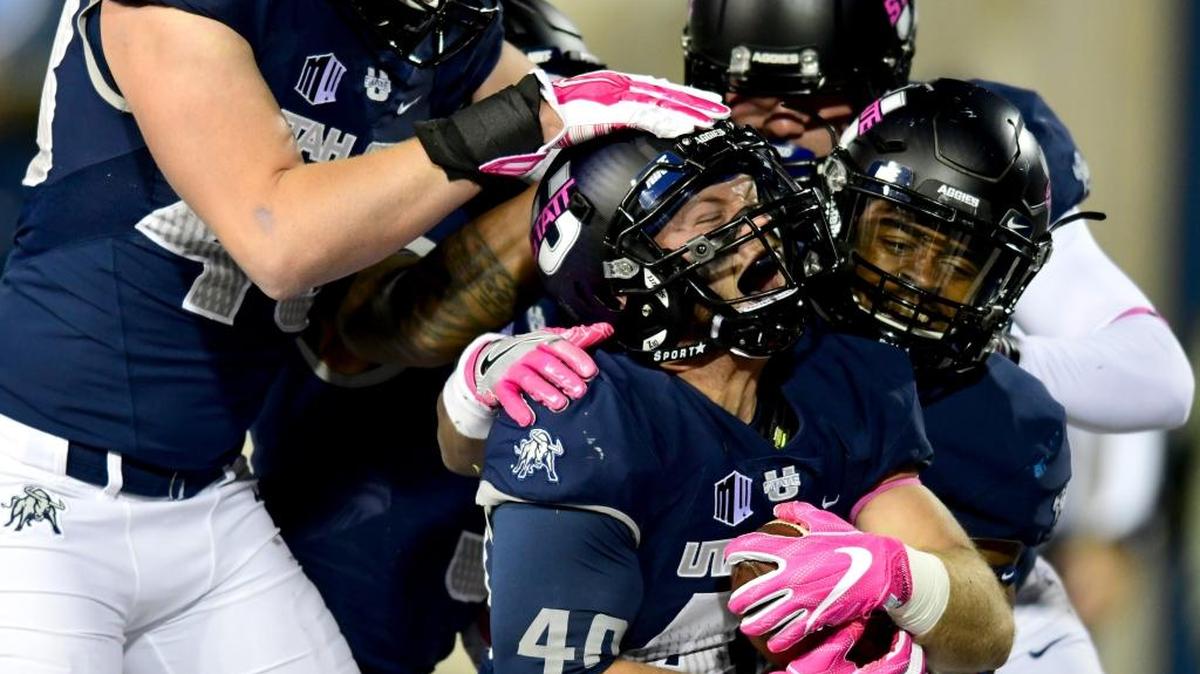 Utah State’s Austin Cheney (40) reacts after recovering a blocked Fresno State punt for a touchdown Saturday, Oct. 22, 2016, in Logan, Utah.