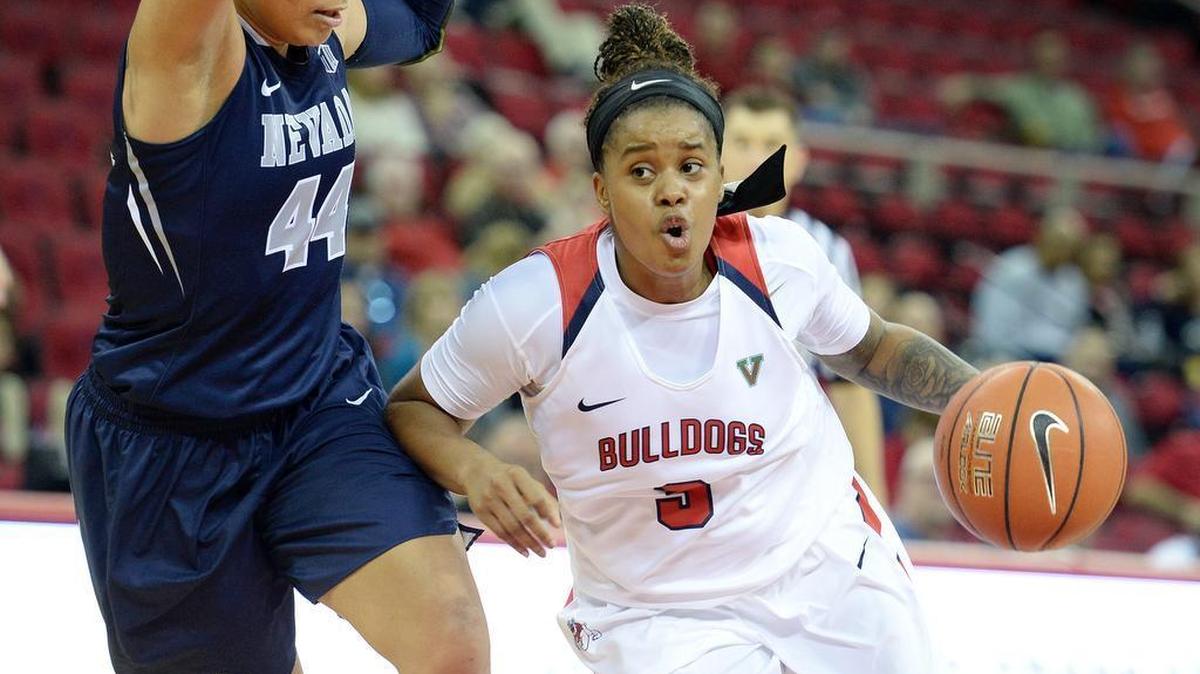 Fresno State’s Tory Jacobs drives against Nevada’s Riana Everidge during their game at the Save Mart Center on Saturday, Jan. 21, 2017. Jacobs scored a career-high 21 points, including 17 in the second half, as the Bulldogs won 68-54.