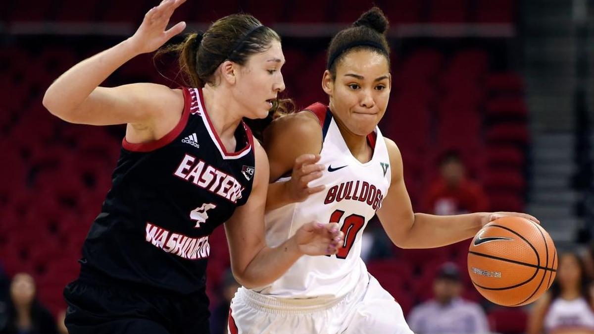 Fresno State’s Candice White, shown here trying to drive around Eastern Washington’s Delaney Hodgins on Nov. 10, 2017, is leading the Bulldogs and is third in the Mountain West at 16.5 points per game entering the conference opener at Nevada.