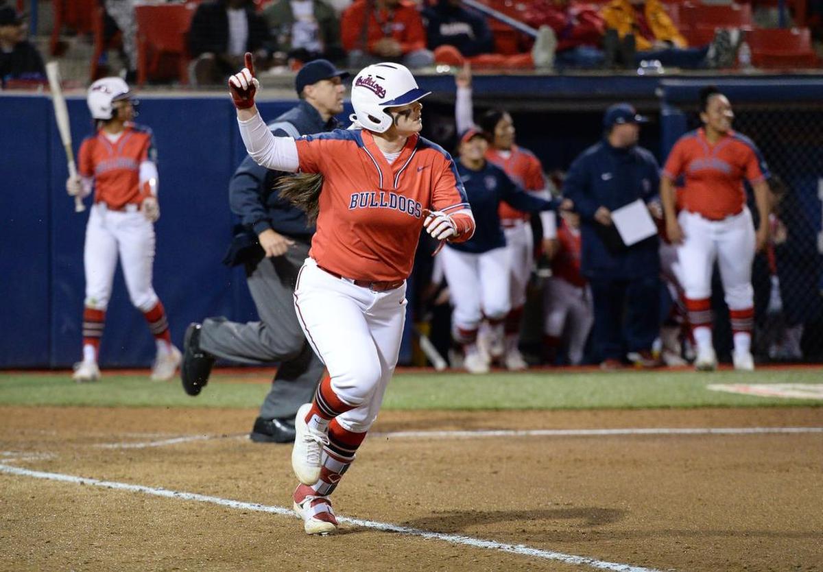 Fresno State’s Kelcey Carrasco watches her home run ball go over the fence agaisnt Montana in the second game of their double-header at Margie Wright Diamond on Friday, March 8, 2019.