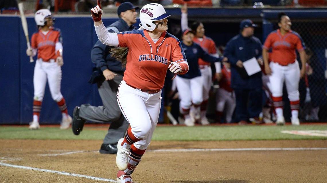 Fresno State’s Kelcey Carrasco watches her home run ball go over the fence agaisnt Montana in the second game of their double-header at Margie Wright Diamond on Friday, March 8, 2019.