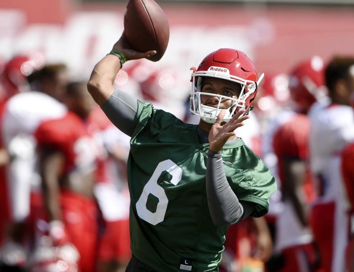 Fresno State quarterback Marcus McMaryion, newly arrived from Oregon State, warms up as a Bulldog at his first practice Saturday morning, Aug. 12, 2017.