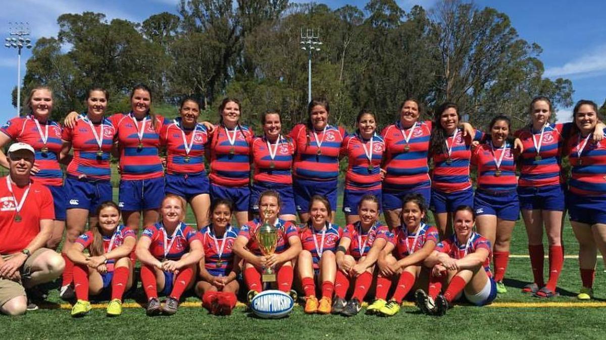 The Fresno State women’s rugby club team poses with their championship trophy after defeating San Francisco 59-25 on Saturday for the USA Rugby West Coast Conference Division III crown.