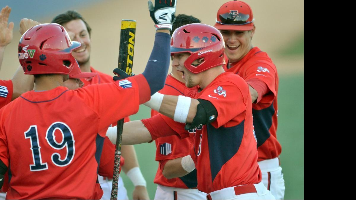 
Fresno State’s Taylor Ward celebrates after hitting a home run in the first inning against Nevada at Beiden Field on April 11, 2015. Ward on Monday, June 8, was selected in the first round of the MLB Draft by the Angels with the 26th overall pick.
