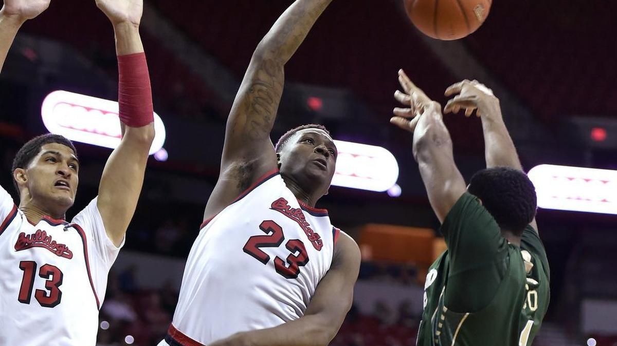 Colorado State’s Antwan Scott (1) releases the ball as Fresno State’s Cullen Russo (13) and Marvelle Harris defend during the first half of an NCAA college basketball game in the semifinals at the Mountain West Conference men’s tournament Friday, March 11, 2016, in Las Vegas. Harris scored 19 points in the Bulldogs’ victory.