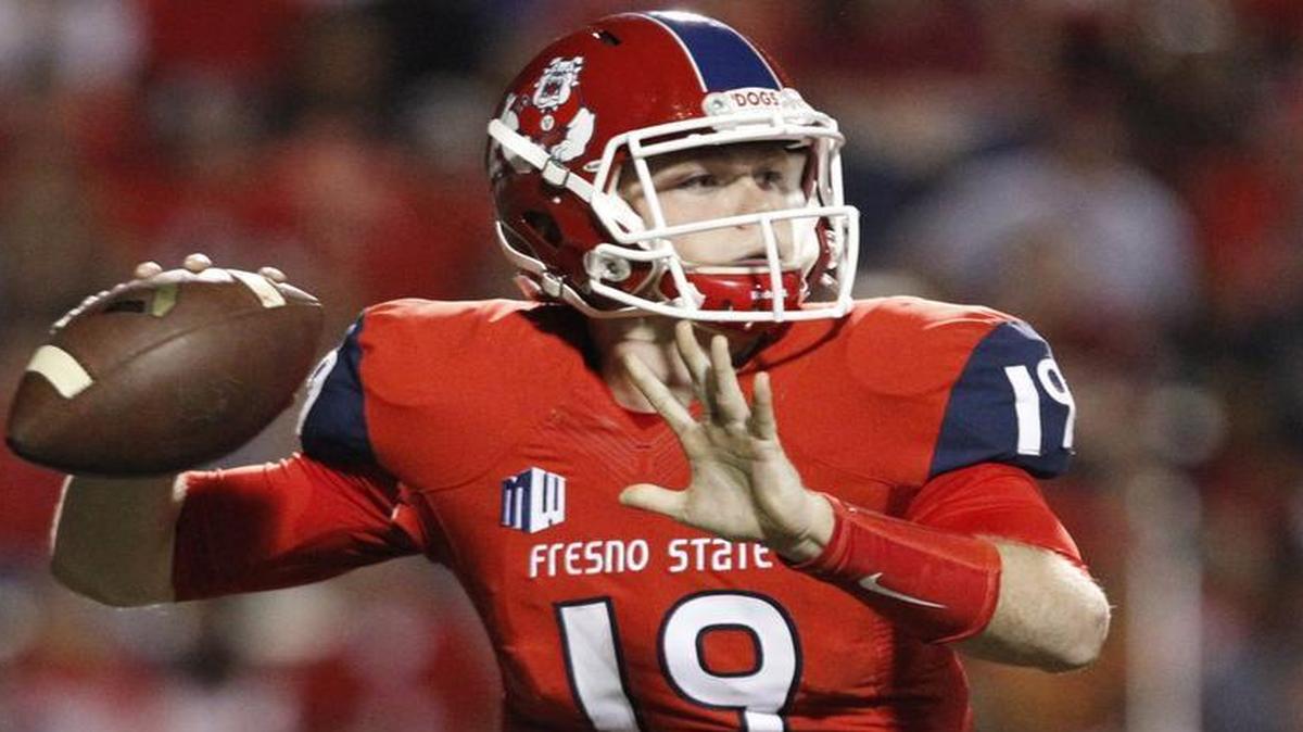 
Fresno State’s Kilton Anderson drops back to pass against Utah State during the first start of his college career on Saturday, Oct. 10, 2015. Bulldogs coach Tim DeRuyter expects to see progress from the redshirt freshman this week when Fresno State hosts UNLV on Friday night at Bulldog Stadium in a national TV game on ESPN2.
