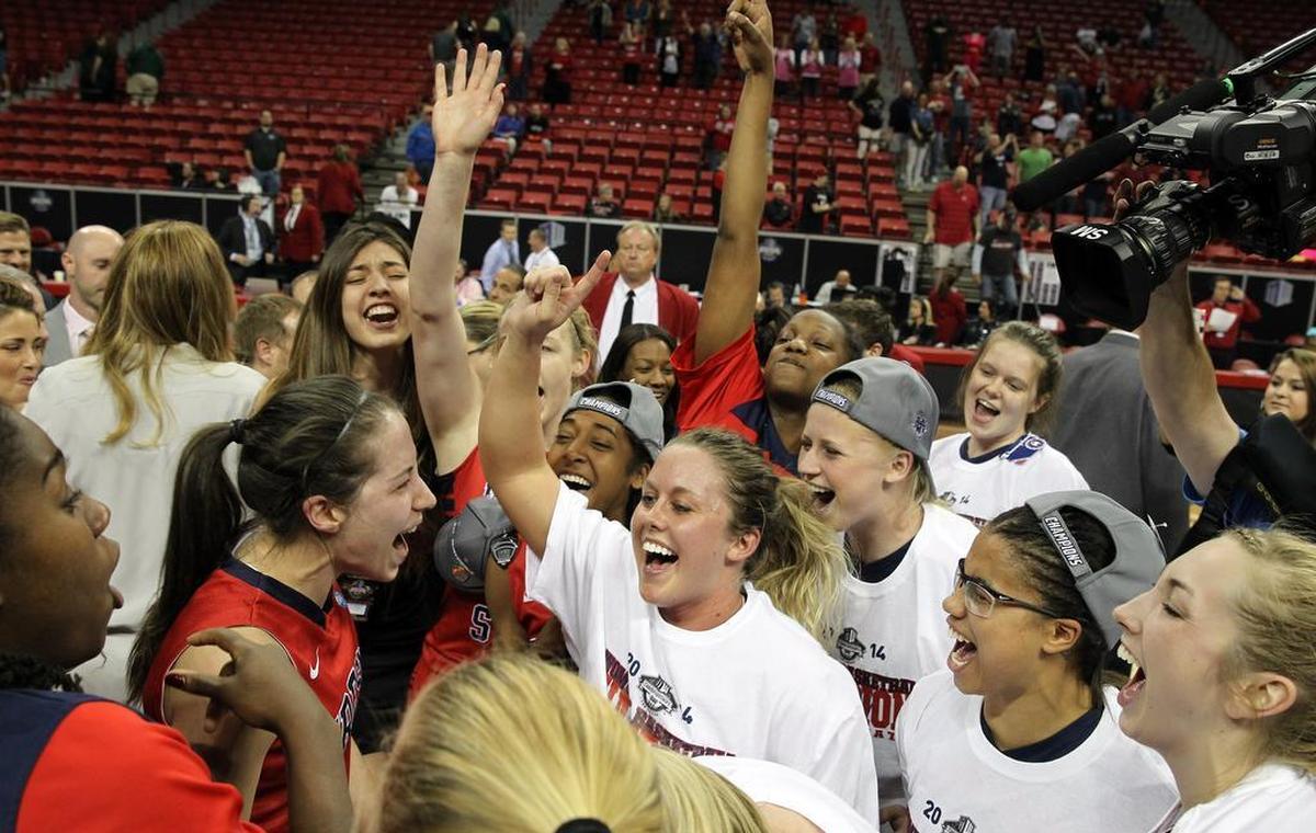 Former Fresno State point guard Taylor Thompson (center) celebrated beating Colorado State in the Mountain West tournament championship back in 2014. She was the Mountain West’s Co-Defensive Player of the Year that season. Thompson went on to marry college sweeheart and former Fresno State football player Nikko Motta on July 29, 2017.