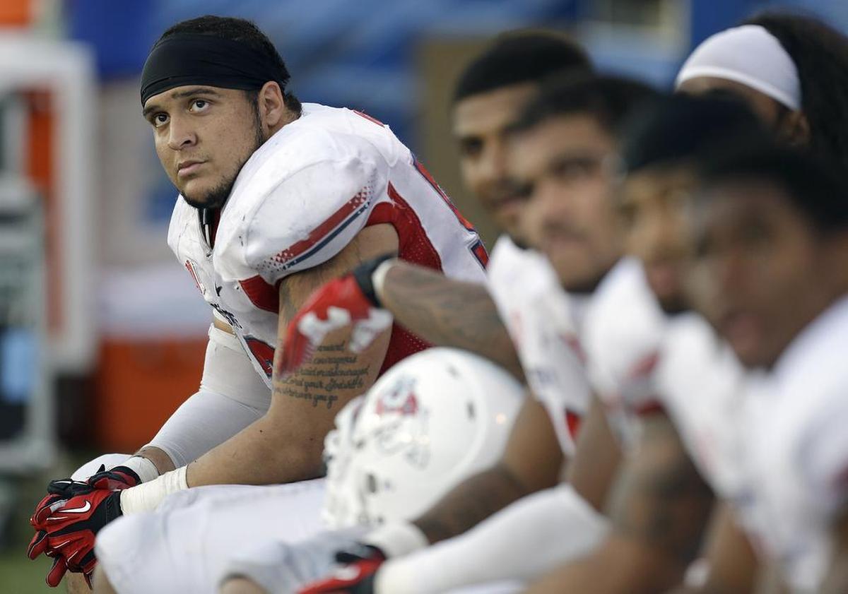Former Fresno State defensive end Nikko Motta (left) was a two-year starter for the Bulldogs and received honorable mention All-Mountain West during his senior season in 2013. He married former Fresno State basketball player Taylor Thompson on July 29, 2017.