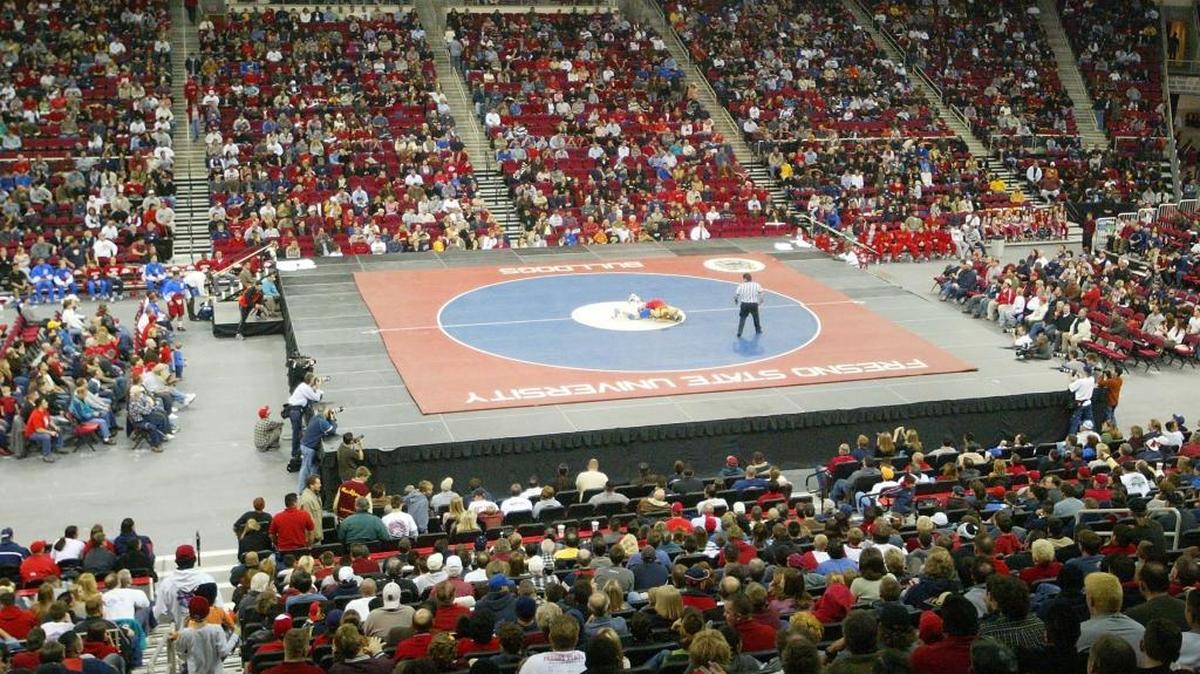 A western-U.S. record crowd of 9,750 watches Fresno State and Iowa State wrestle Jan. 6, 2004, at Save Mart Center. Two years later, Fresno State dropped its program but now has launched a head-coaching search as part of a timeline to have a new team in place and against competing at the Division I level by 2017-18.