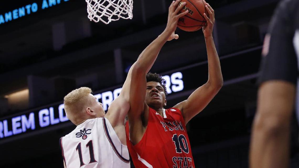 Fresno State forward Orlando Robinson, right, seen in action against Saint Mary’s, had a career-high 15 rebounds in the Bulldogs’ 62-37 victory at Cal Poly, Saturday Dec. 14, 2019 including five at the offensive end.