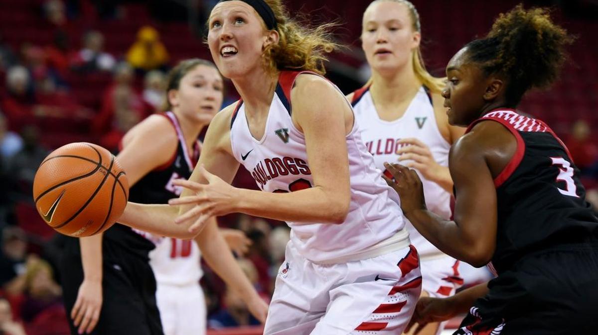 Fresno State's Kristina Cavey, center, gets up a shot in the lane in front of Eastern Washington's Symone Starks in the Bulldogs’ 81-56 victory, Nov. 10, 2017 in Fresno. Cavey, a sophomore, hit 8 of 10 shots in scoring a career-high 21 points and added three rebounds and three assists.