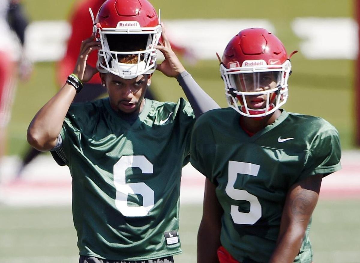 Fresno State quarterback Marcus McMaryion, left, newly arrived from Oregon State, will look to get up to speed quickly and compete with Chason Virgil, right, and Jorge Reyna for the starting job in 2017.