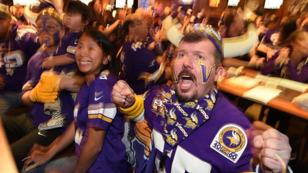 Stewart Kukowski and around 100 other members of the Central California Minnesota Vikings fan club cheer during the game with the Philadelphia Eagles on Sunday afternoon at Black Angus.