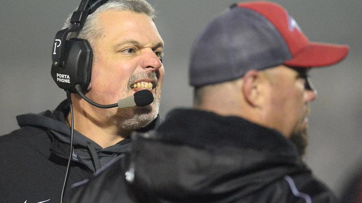 Hanford High coach Josh Young, shown left during the Bullpups’ 33-21 win over Bonita Vista-Chula Vista on Dec. 19, 2015 for the CIF State Division IV-AA title, turns to Plan B following the season-ending loss of star quarterback Ryan Johnson.