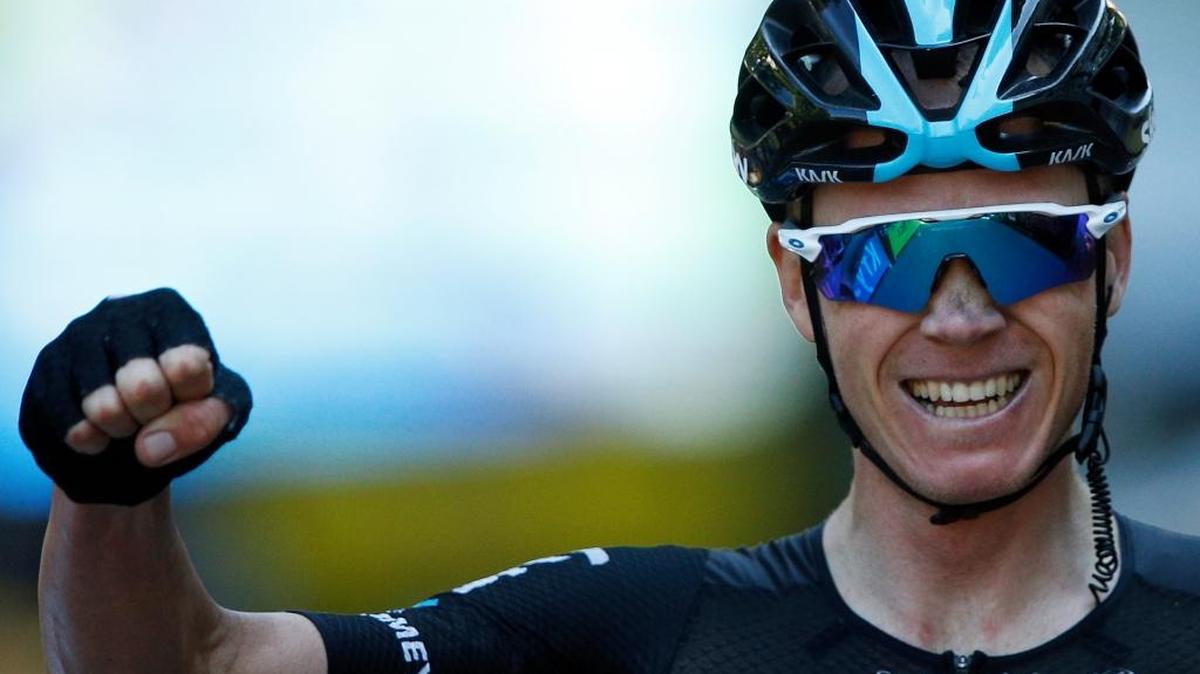 Britain’s Chris Froome celebrates as he crosses the finish line to win the eighth stage of the Tour de France cycling race over 184 kilometers (114.3 miles) with start in Pau and finish, Saturday, July 9, 2016 in Bagneres-de-Luchon, France.