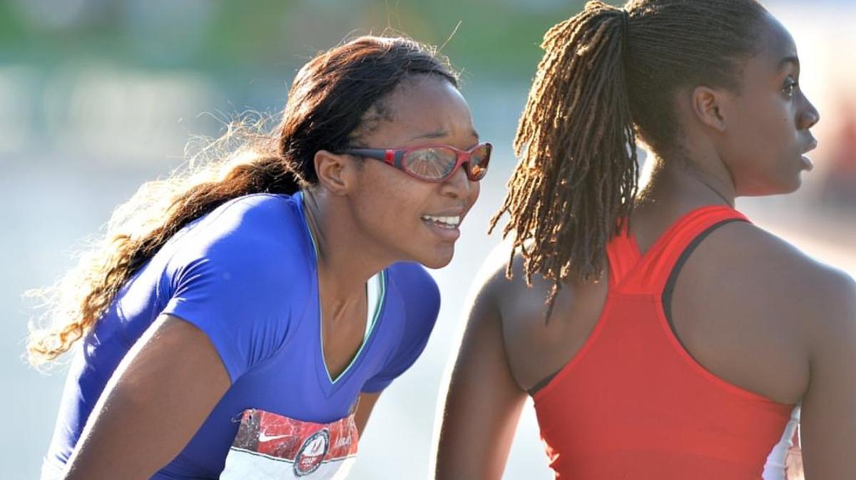 Hannah Waller, left, and Lynna Irby react after finishing the 400 finals on USA Track & Field Junior Outdoor Championships on Sunday. Waller finished second behind Irby but was disqualified for a lane violation.