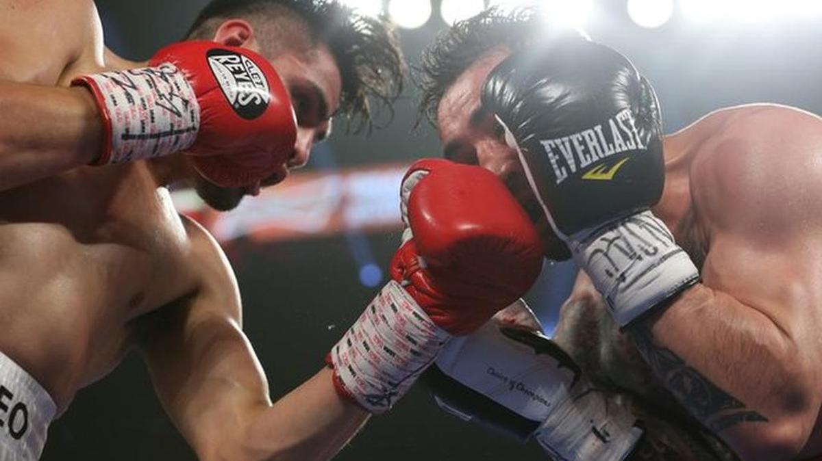 Jose Ramirez, left, battles in close against Manny Perez during the fighters’ 10-round super lightweight bout on the undercard of Timothy Bradley Jr./Manny Pacquiao III at MGM Grand Garden Arena in Las Vegas. Ramirez, the Avenal native and 2012 Olympian, pounded out a unanimous decision to improve to 17-0 as a pro.