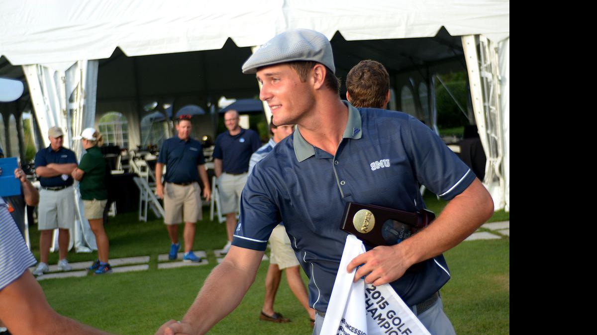 
Bryson DeChambeau of SMU receives congratulations after winning the NCAA championship with a score of 8-under 280 on Monday in Bradenton, Florida.
