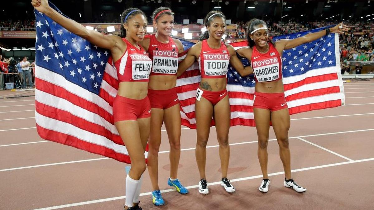 Jenna Prandini, second from left, was part of a U.S. 400 relay team that captured the silver medal at the World Athletics Championships in Beijing.