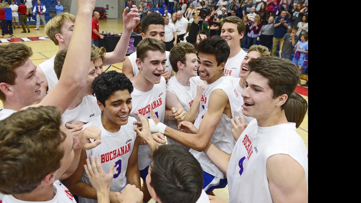 
Buchanan players celebrate after beating Clovis North for the Central Section Division I championship Friday at Buchanan High.
