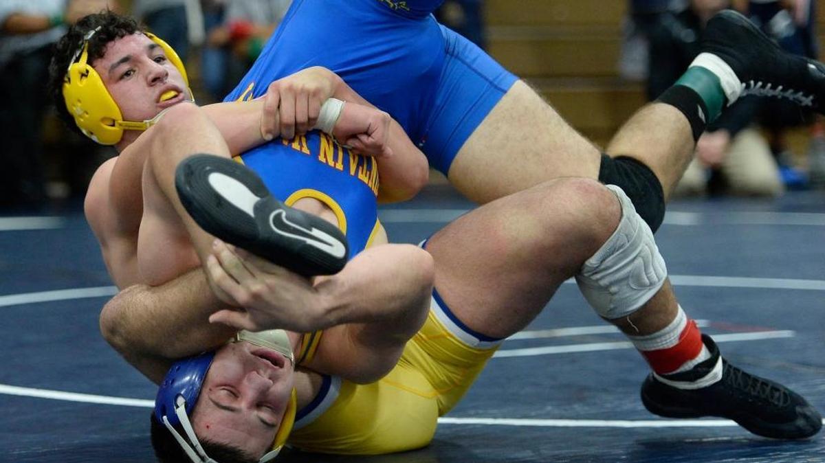 Clovis’ Josh Hokit, top, is one of 28 nationally ranked wrestlers expected to be in the field for the Doc Buchanan Invitational on Friday and Saturday at Clovis High. Hokit is ranked No. 6 at 195 pounds by Flo Wrestling.