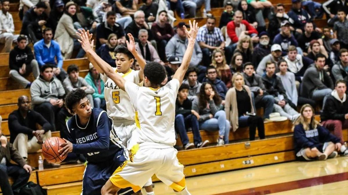 Redwood High beat Golden West in last year’s Polly Wilhelmsen Invitational championship game. The 67th annual event is this week at Redwood and Mt. Whitney high schools. It is the state’s longest-running 16-team boys basketball tournament.