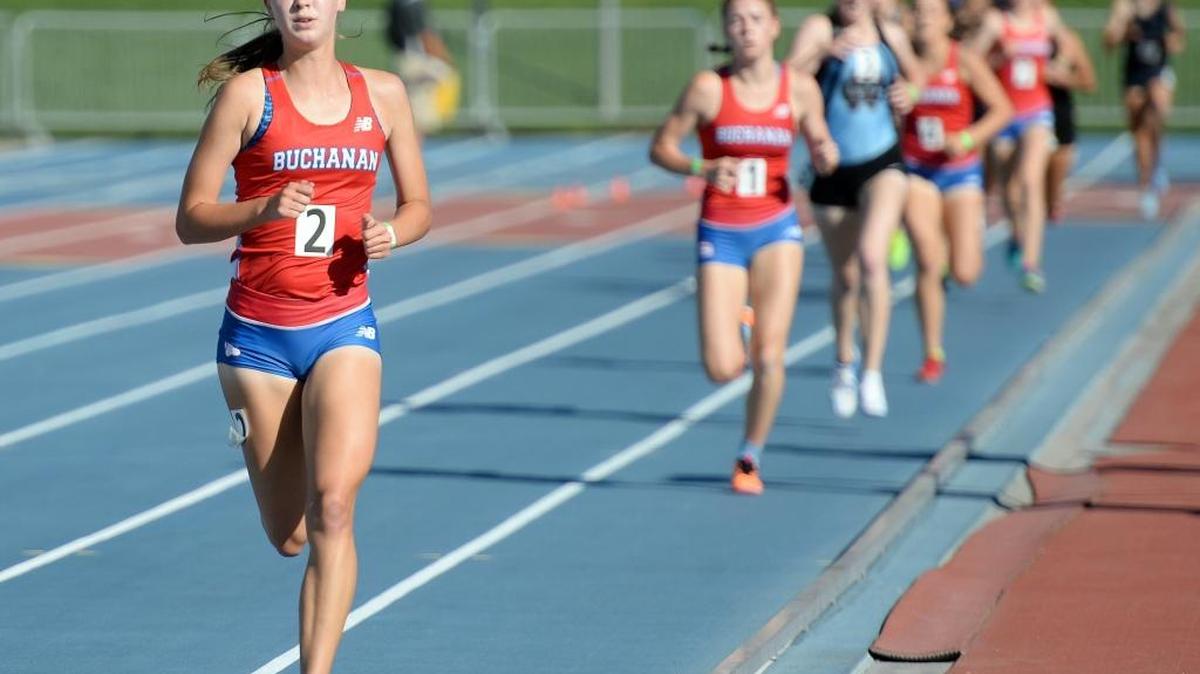 Buchanan High’s Corie Smith pulls away from the field in the 1,600 at the Central Section Track and Field Championships on Saturday, May 20, 2017, at at Buchanan's Veterans Memorial Stadium.