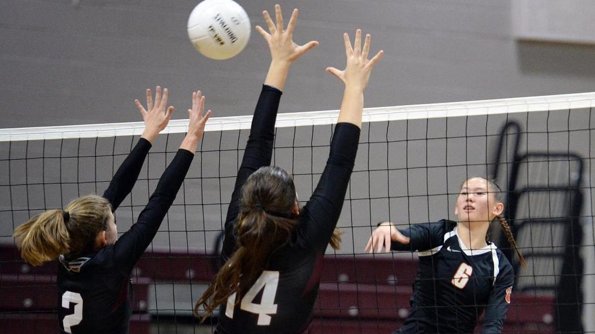 Selma High’s Caitlyn Hansen, right, and the rest of the Bears advanced to Thursday’s semifinals of the Central Section Division II playoffs after a 3-0 sweep of Fresno Christian. Fifth-seeded Selma faced a big hurdle, a match against No. 1 California City.