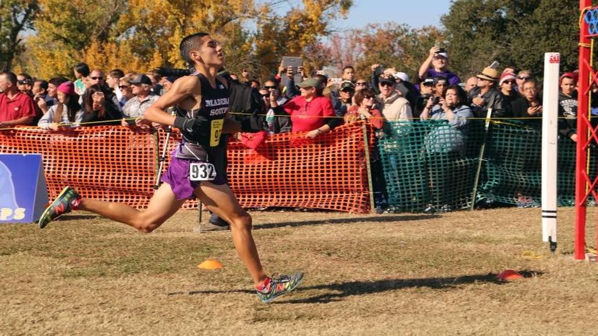 Madera South’s Miguel Villar, shown placing 11th in Division I of the 2015 CIF State Cross Country Championships at Woodward Park, is top-ranked in the Central Section in 2016.