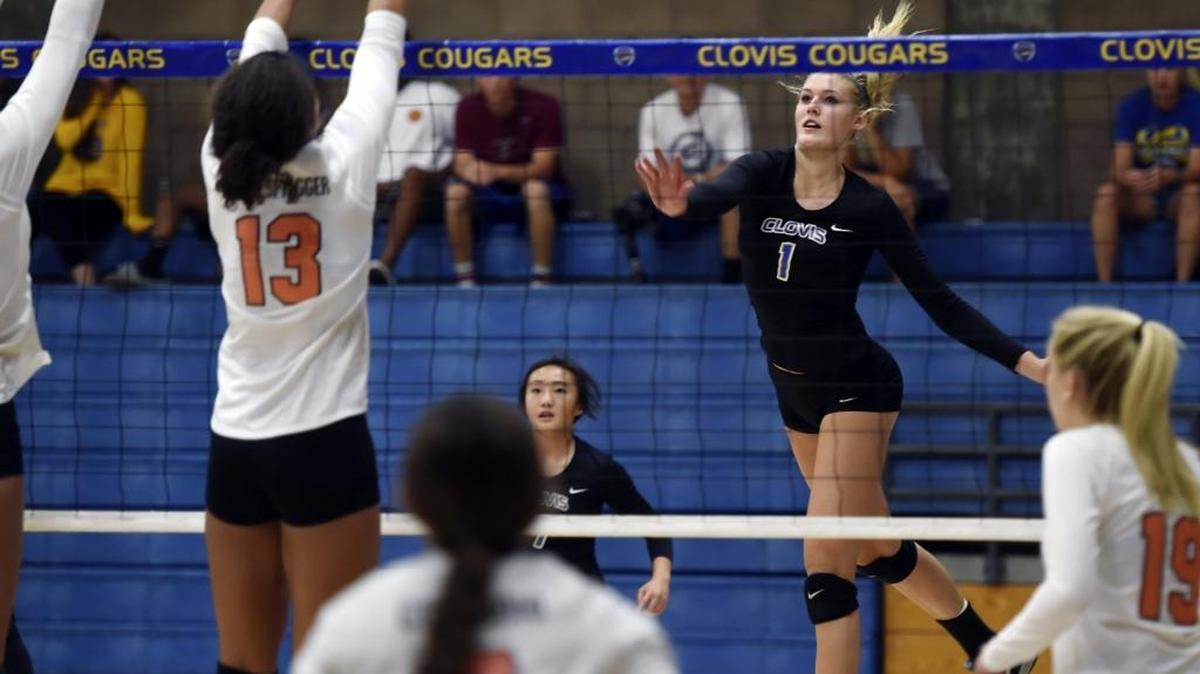 Clovis High’s Taylen Ballard, right, was named MVP of the Clovis Volleyball Challenge after making 105 kills in 15 sets during the Cougars’ 8-0 run to the title.