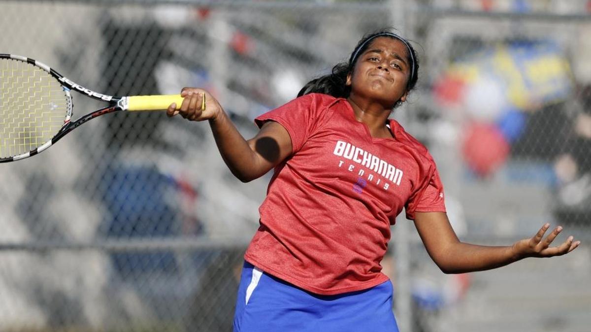 Buchanan High’s Sravya Gudipudi, pictured, returns to Stockdale’s Arianna Tilbury in the Central Section Division I team tennis championship match Tuesday. Gudipudi rallied for a 2-6, 6-0 (10-2) win to help the Bears to a 6-3 victory.