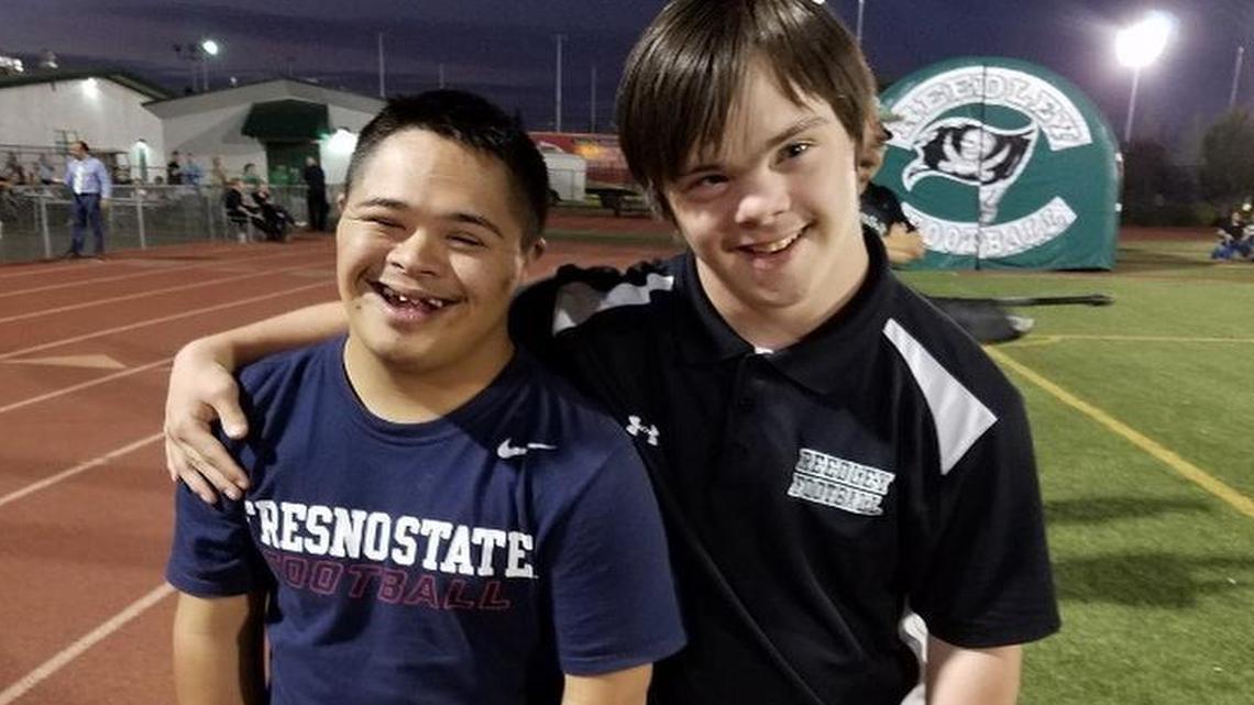 As pointed out by a local sports writer, Sanger High graduate Jordan Campos (left) and Jack Welsh of Reedley (right) have fun together despite it being rivalry night between the Apaches and Pirates. Friday marked the 104th annual meeting.