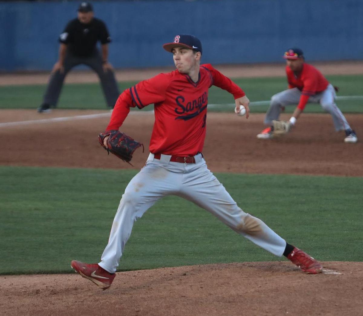 Sanger High’s Jake Harrell pitches in a duel against San Joaquin Memorial during an extra innings championship game loss at Beiden Field in Fresno, Calif., Friday, May 17, 2019.