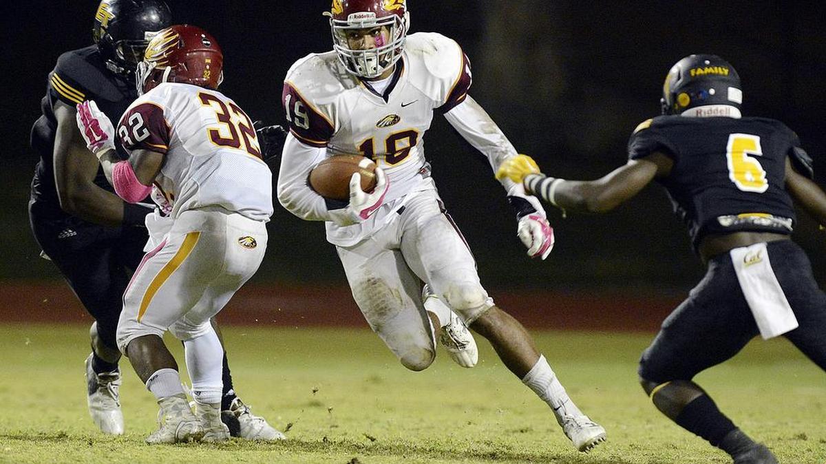 Clovis West’s Caleb Kelly, center, was the only Central Section player among the 30 named first-team All-State by CalHisports.com.