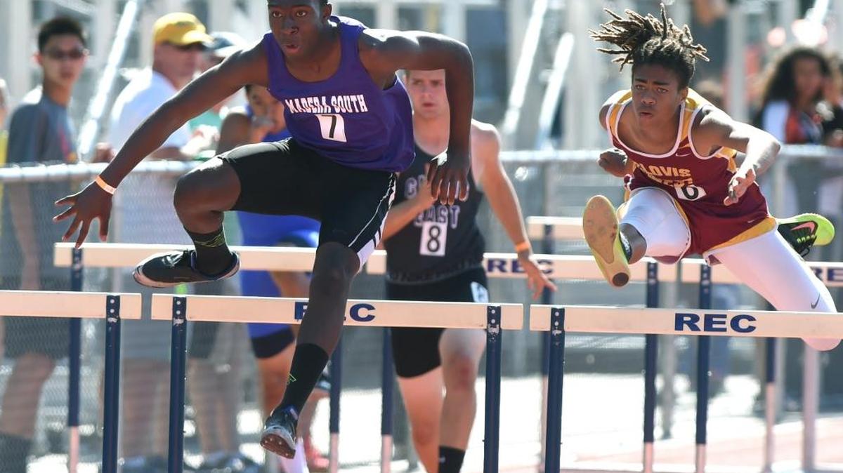 Madera South High’s Amire Green cruises to a win in his 110-meter hurdle heat at the Central Section North Area meet Wednesday, May 11, 2016, at Clovis East.