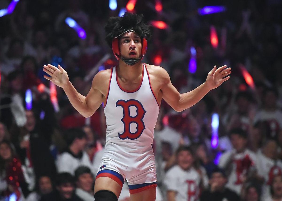 Buchanan’s Maximo Renteria celebrates his victory in the Clovis dual in January. Renteria is one of eight Bears who have advanced to the semifinals at the state meet in Bakersfield, putting the Bears on track for a fourth straight team title.