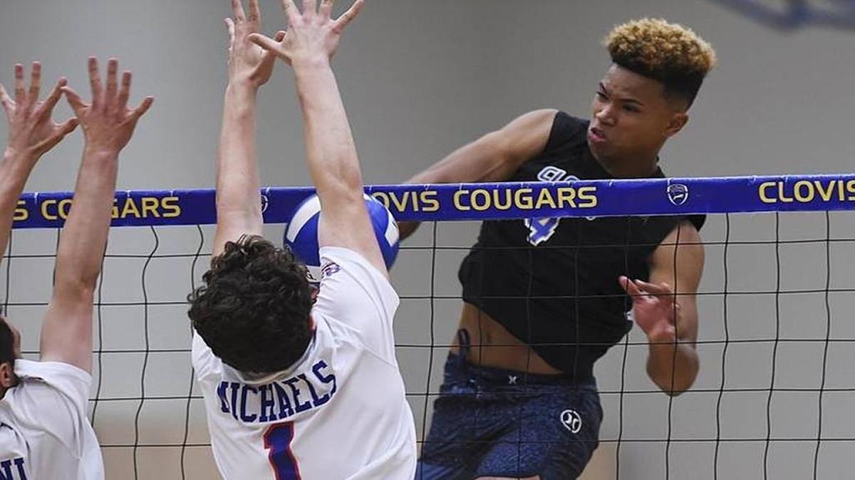 Clovis High’s Zevan Williams, spiking against Buchanan, has been named to the American Volleyball Coaches Association’s 11th annual high School Senior All-America Team.