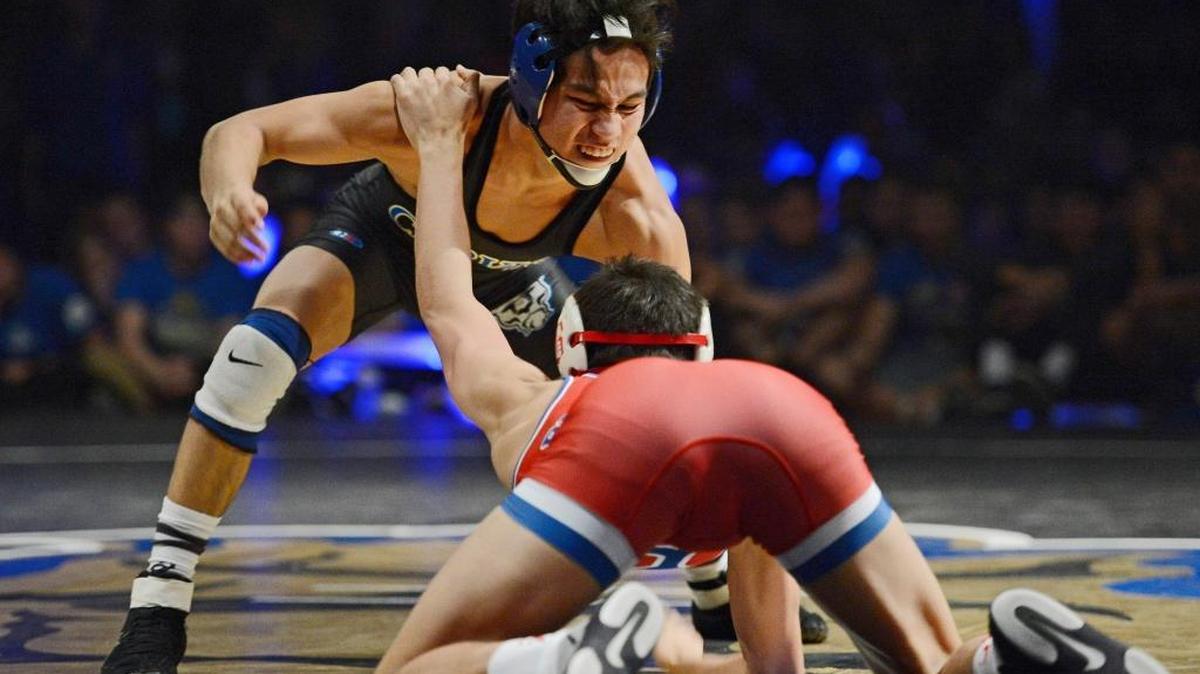Clovis junior Justin Mejia, top, can become the fourth wrestler in the history of the CIF State Wrestling Championships to win titles in his first three high school seasons with a successful run through the 120-pound bracket.