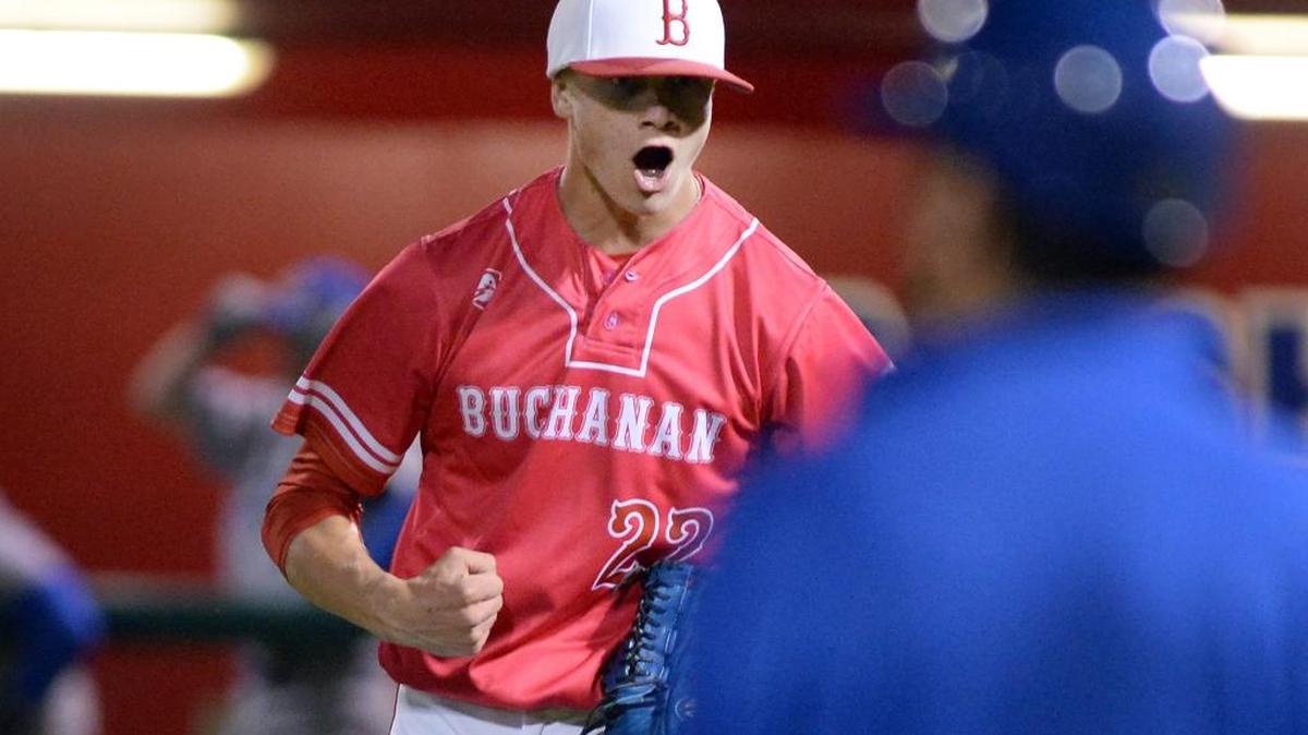 Buchanan closer Jacob King celebrates after recording the final out for a win against Clovis in a March Tri-River Athletic Conference matchup.